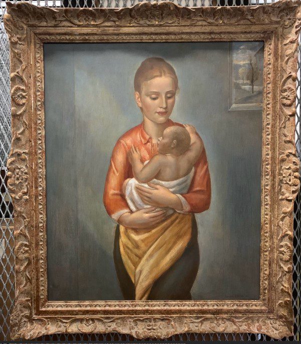 Girl Holding a Baby