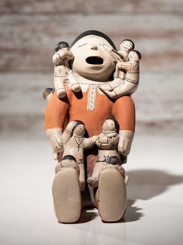 Storyteller with Eleven Children